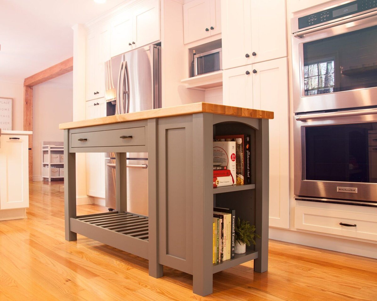 Close-up of a functional kitchen island in a transitional style kitchen, completed by Craft Design + Build in Killingworth, Essex, Connecticut