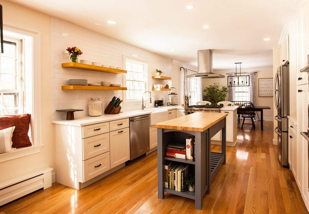 Kitchens, Essex, Connecticut bright and open remodel by CRAFT design+build, featuring wooden shelves and white cabinetry