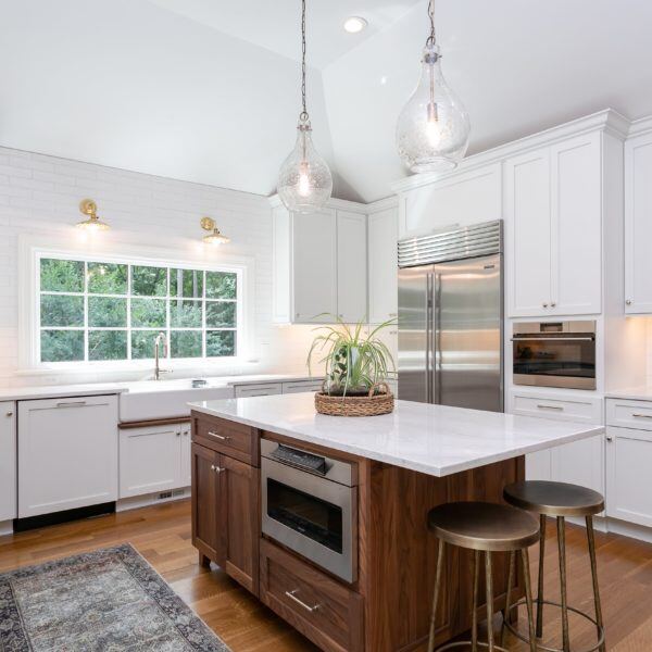 Kitchens, Essex, Connecticut remodel by CRAFT design+build, with stainless steel appliances and a spacious kitchen island