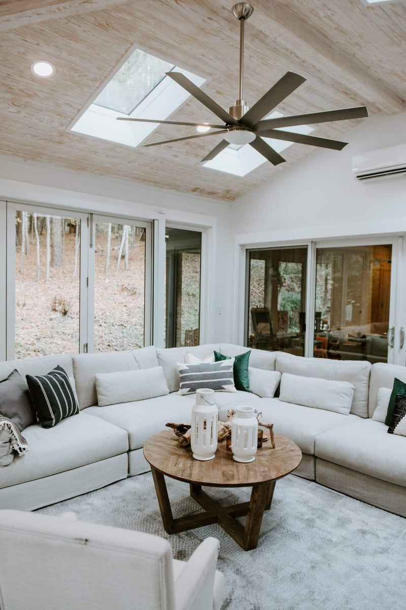 Luxurious 4 seasons room with comfortable seating and ample natural light in Essex, Connecticut, by Craft Design + Build