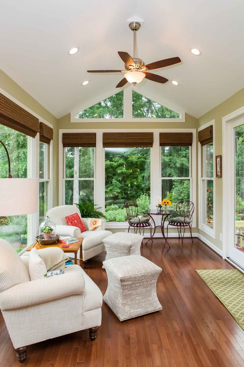 Spacious custom sunroom addition with garden views in Essex, Connecticut by Craft Design + Build