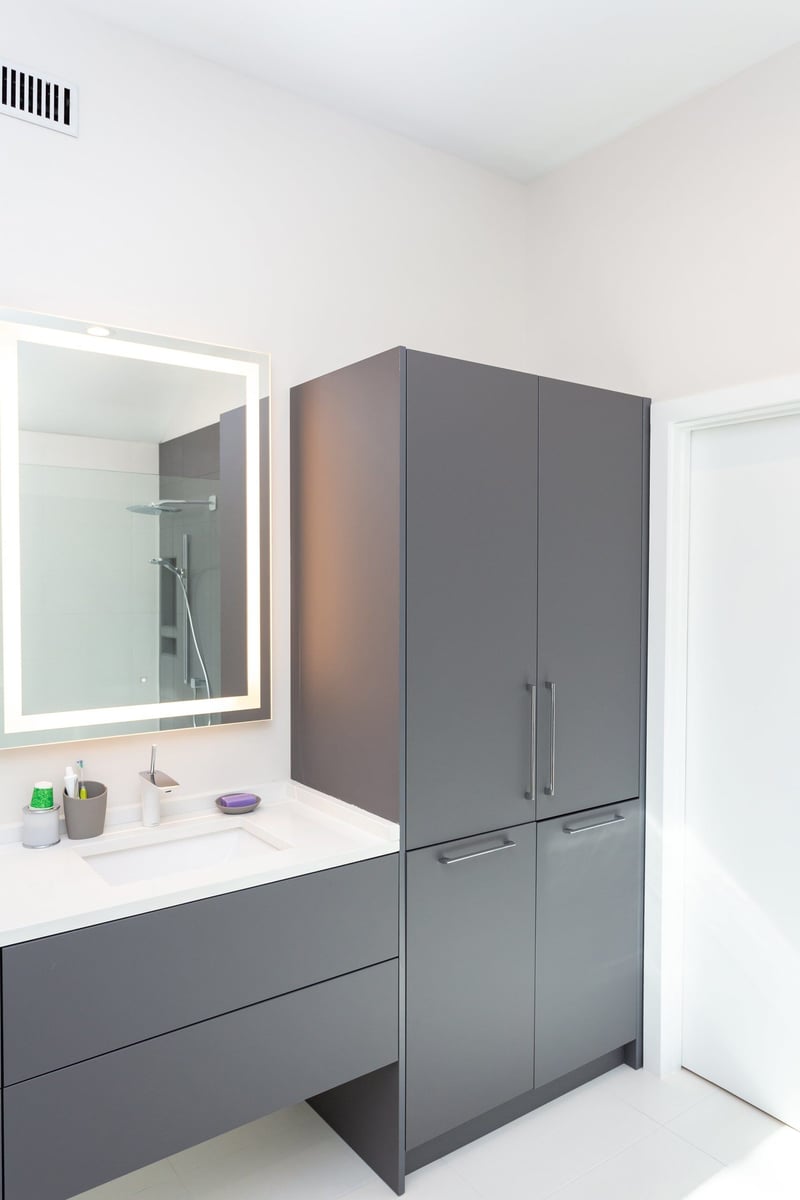 Stylish bathroom vanity area in an Essex, Connecticut renovation by Craft Design + Build